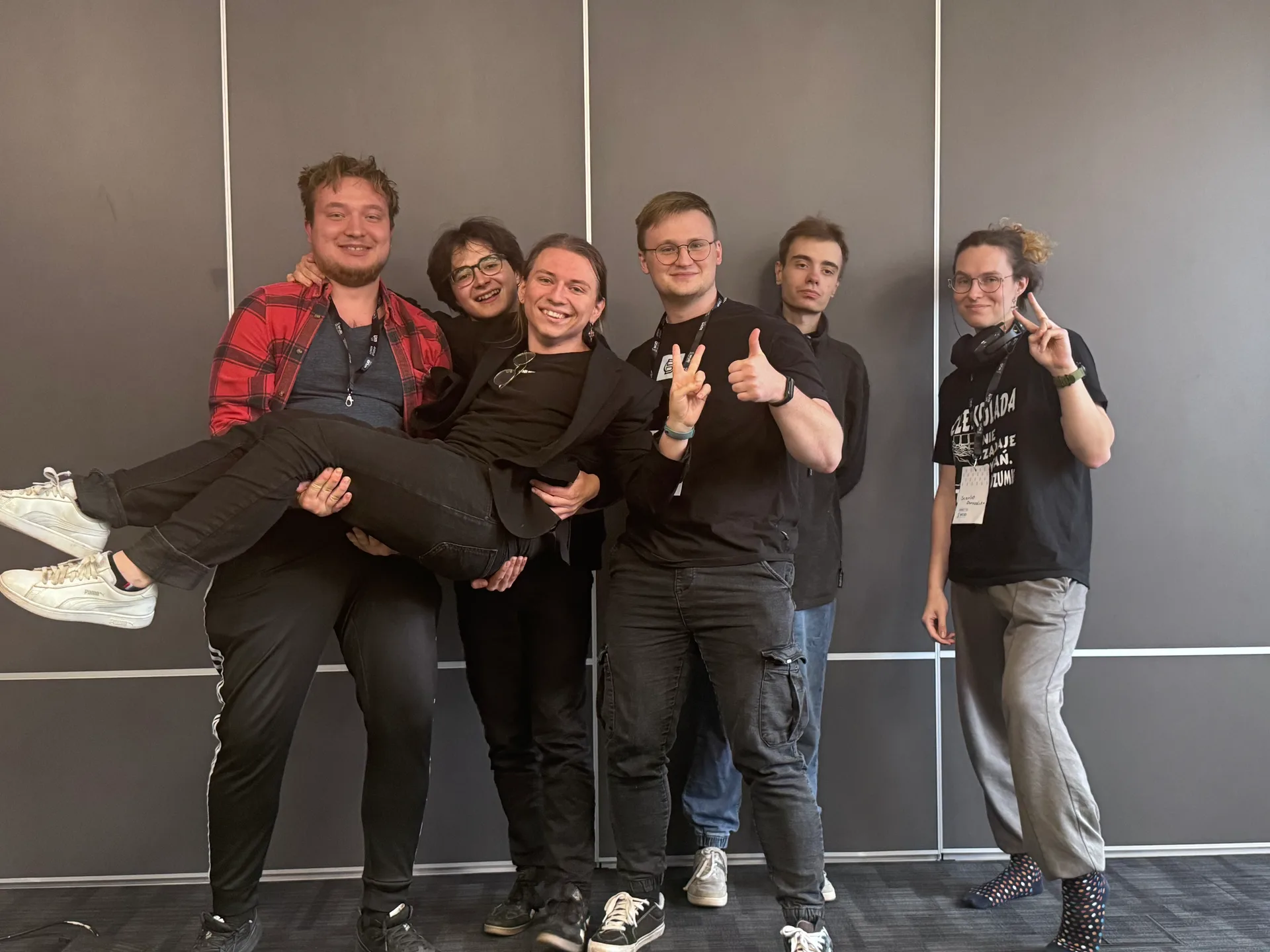The six-person WUD 2026 team posing together at the hackathon